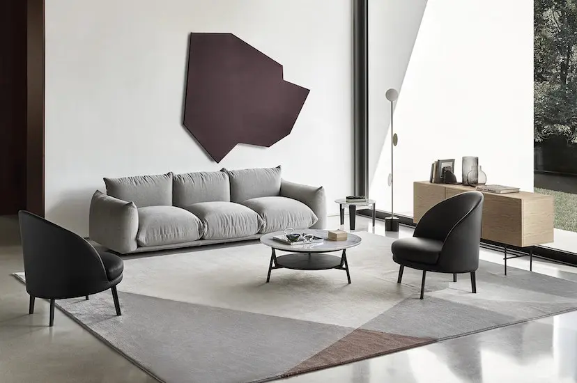 grey marenco sofa part of arflex furniture collection in a modern living room