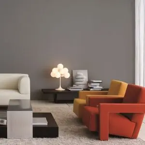 Cassina Milano and Cassina Milano Showroom featuring 637 UTRECHT ARMCHAIR GERRIT by designer and architect THOMAS RIETVELD