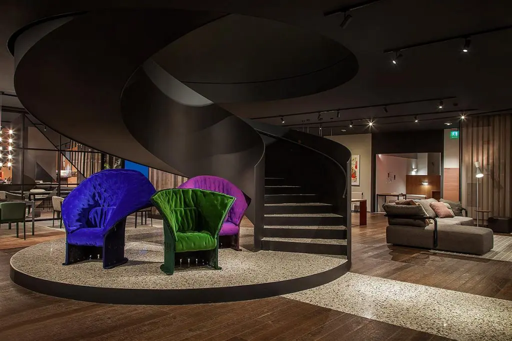 Cassina Milano and Cassina Milano Showroom featuring spiral staircase and Italian armchair entitled 357 FELTRI GAETANO PESCE