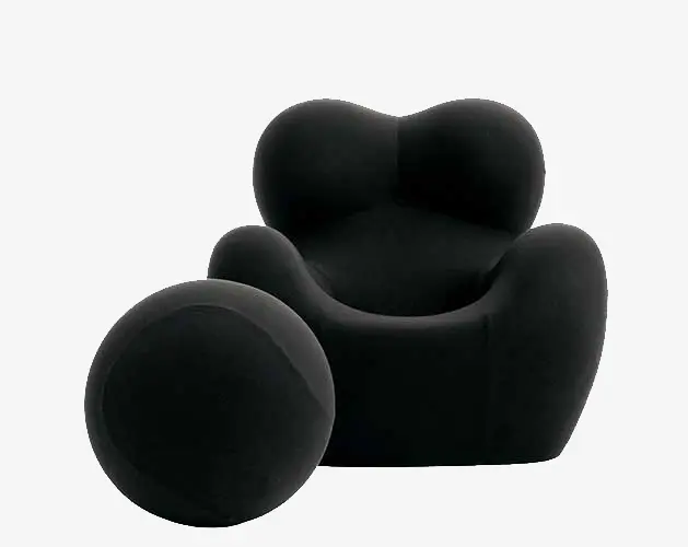 Black upholstered rounded armchair with a matching round ottoman