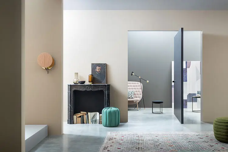 pivot door by lualdi model compass in a contemporary living room
