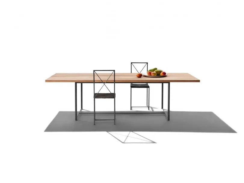 outdoor dining table and chairs by flexform an Italian furniture manufacturer