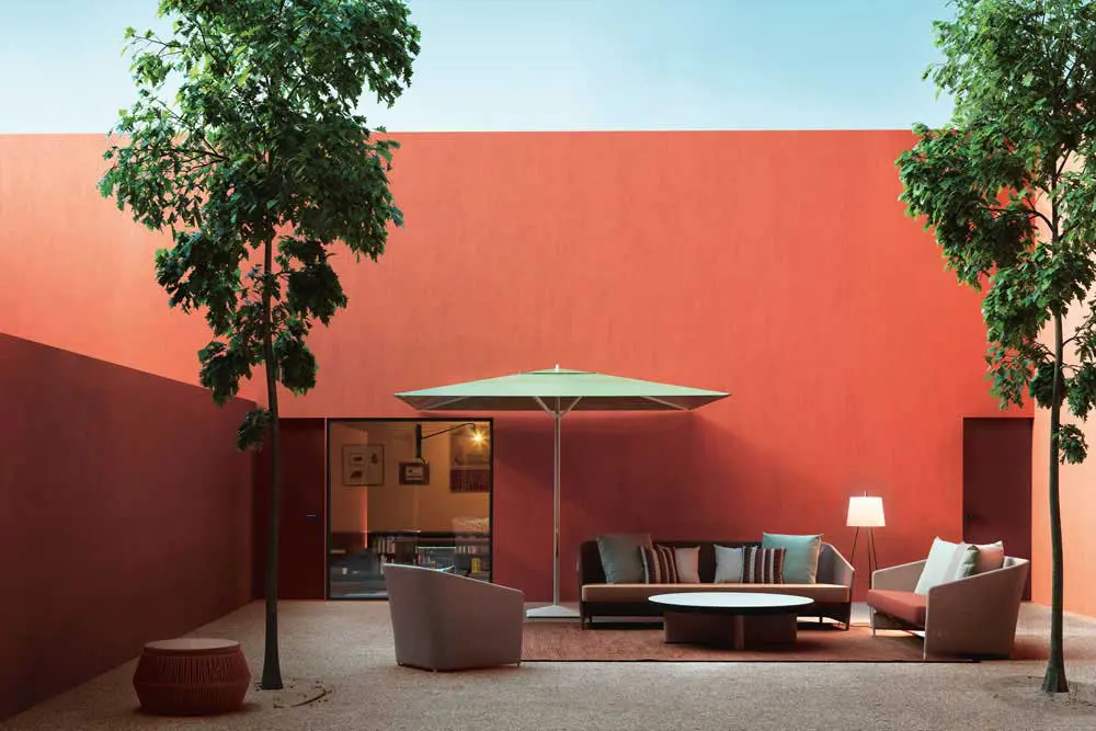 bitta sofa set by kettal a high end outdoor furniture brands in a contemporary interior garden