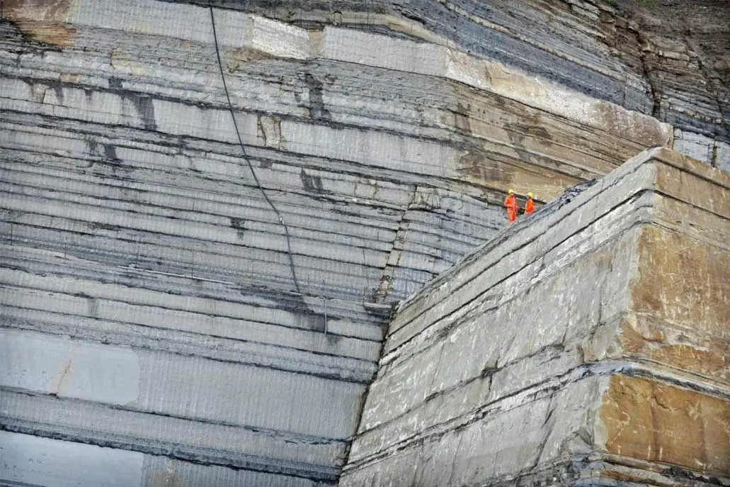 Layered wall of a marble quarry