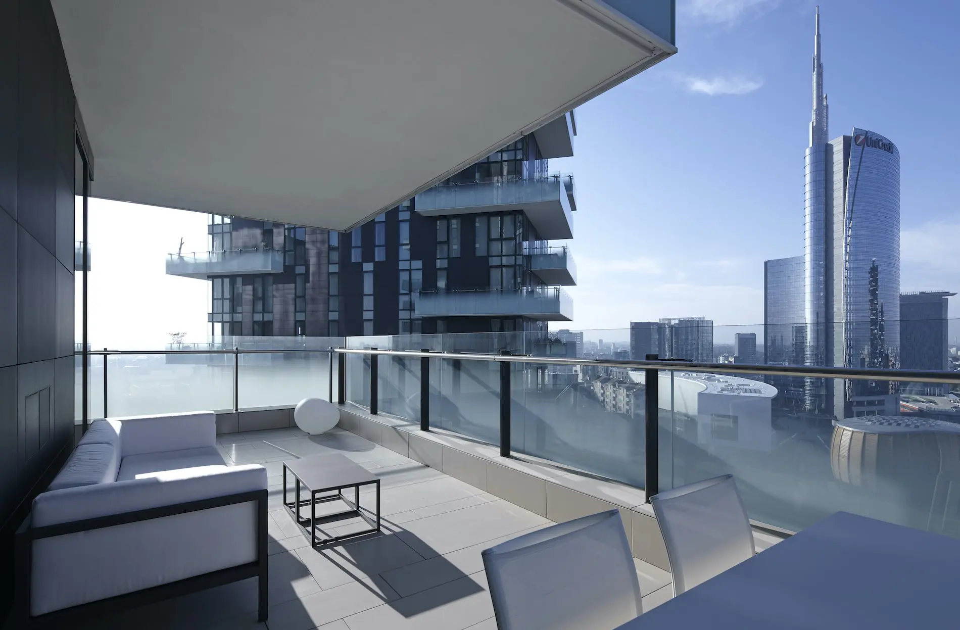 Balcony overlooking the Milan skyline at daytime
