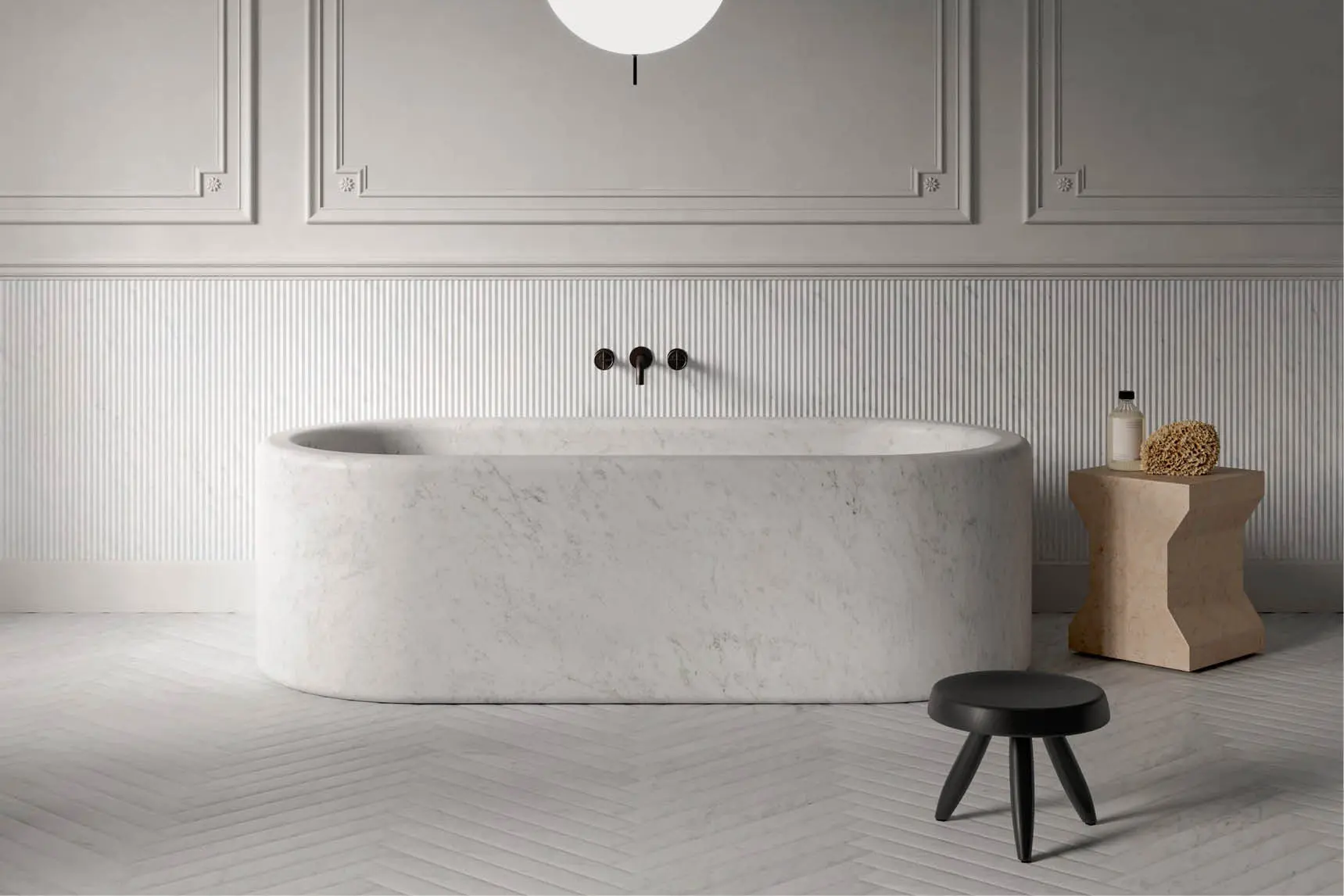 Freestanding marble bathtub in a bathroom with panelled walls