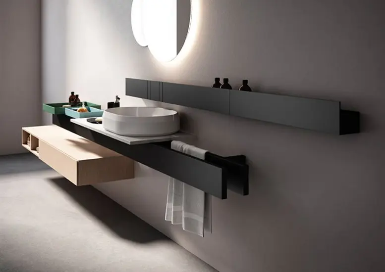 floating bathroom vanity with a round sink and a wooden drawer unit