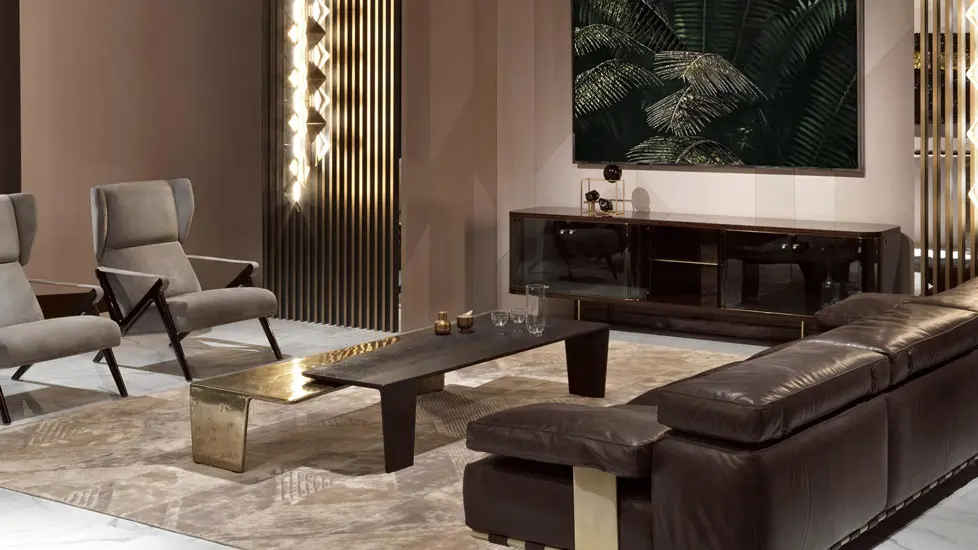 living room with gold-accent wall panels, wingback chairs and a dark coffee table