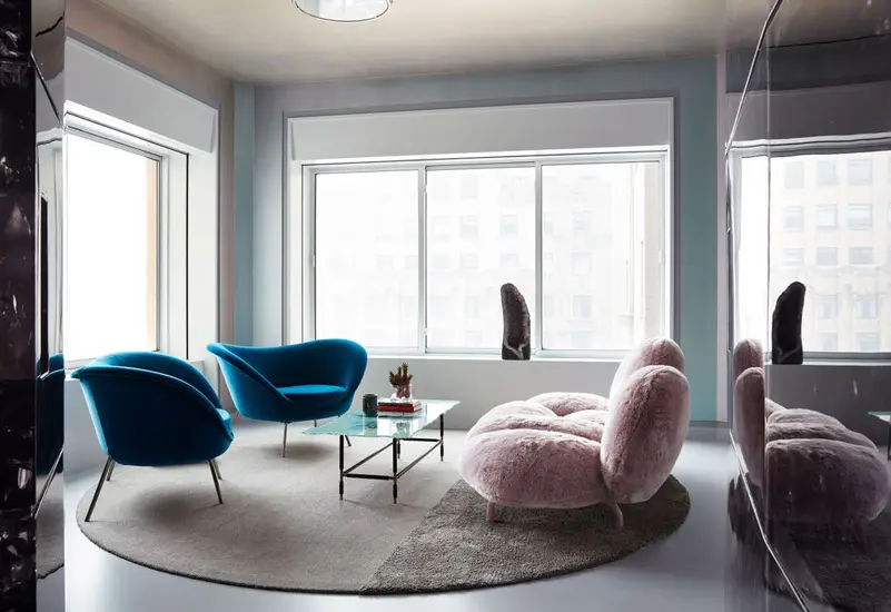 D'aquino Monaco one of the top nyc interior designers and blue Molteni armchair