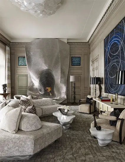 living room with a large sculptural fabric installation above a fireplace