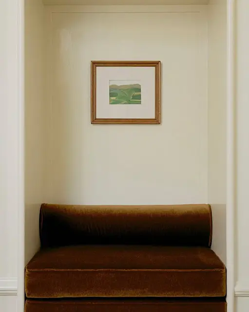Sofa in a niche in a house with matching finishes