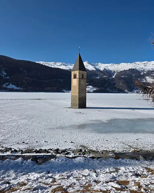 The church in the middle of Lake Resia, picture taken during the visit to the cave